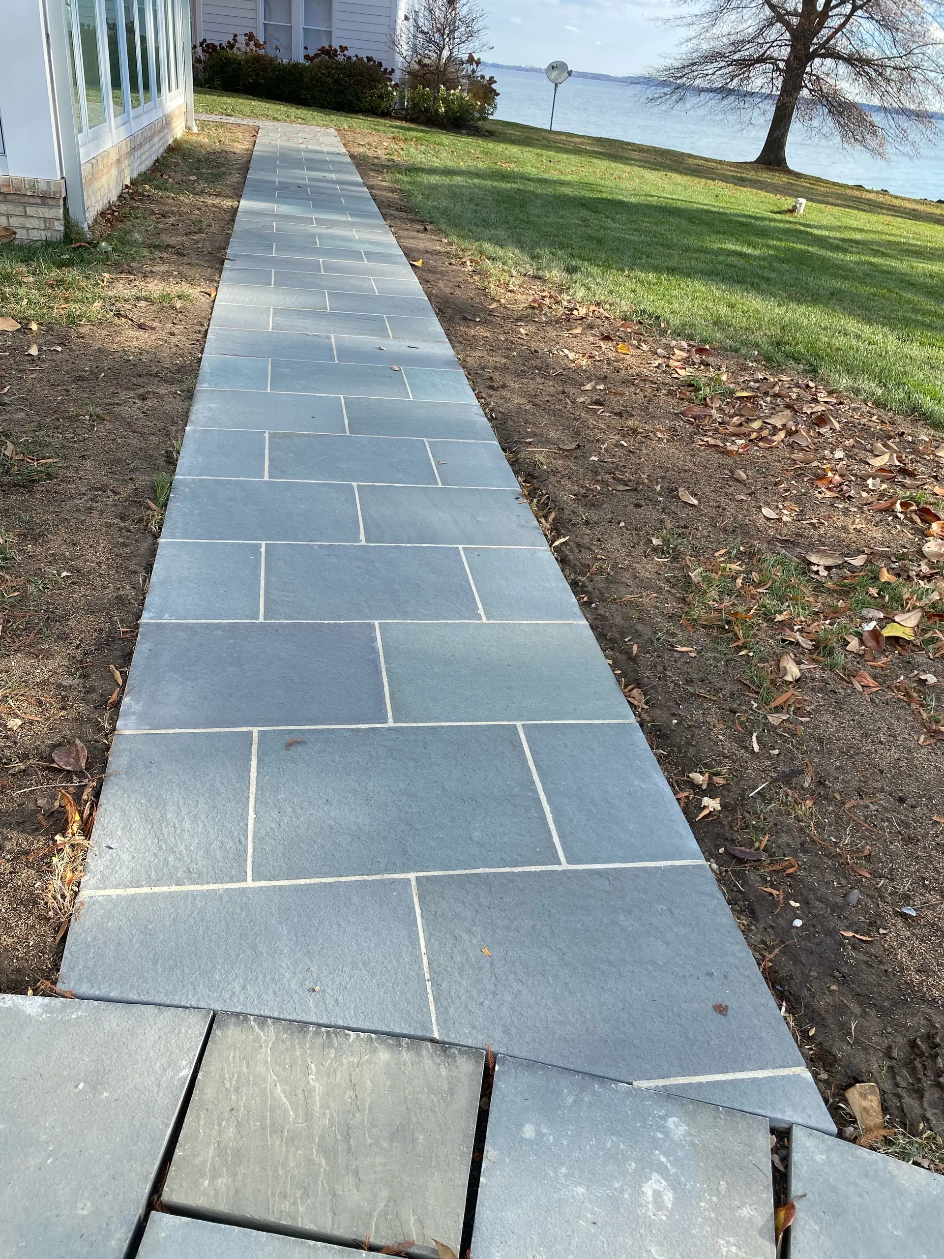 Bluestone walkway leading toward the Chesapeake Bay waterfront